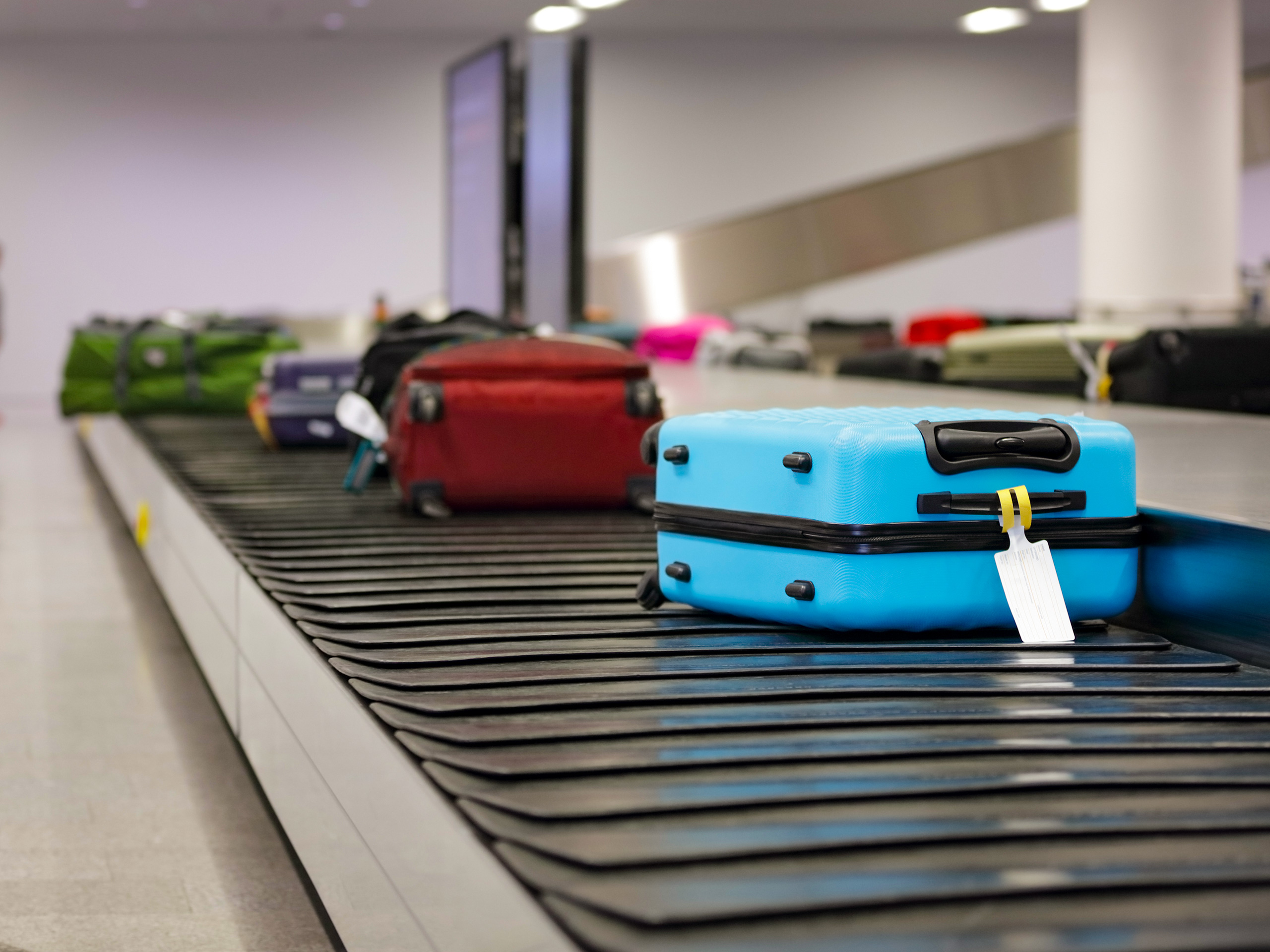 Suitcases on baggage claim